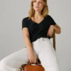 Borsa a tracolla effetto pelle con patta Borsa a tracolla effetto pelle con patta