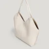 Borsa Tote effetto pelle con borchie