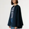 Cappotto a mantella con colletto a camicia Cappotto a mantella con colletto a camicia