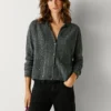 Cardigan in maglia con paillettes Cardigan in maglia con paillettes