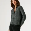 Cardigan in maglia con paillettes Cardigan in maglia con paillettes