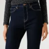 Jeans a vita alta e zampa – Dion