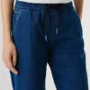 Jeans a vita media e vestibilità ampia – Eva