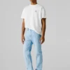 Jeans a vita media e vestibilità dritta