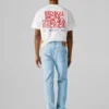 Jeans a vita media e vestibilità dritta