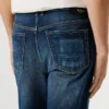 Jeans a vita media e vestibilità dritta – Byron