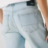 Jeans a vita media e vestibilità dritta – Byron