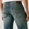 Jeans a vita media e vestibilità dritta – Cash