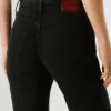 Pantaloni a zampa con 5 tasche