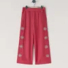 Pantaloni larghi con ricami floreali Pantaloni larghi con ricami floreali