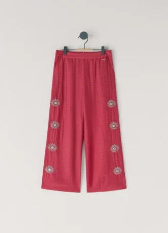 Pantaloni larghi con ricami floreali Pantaloni larghi con ricami floreali
