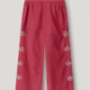 Pantaloni larghi con ricami floreali Pantaloni larghi con ricami floreali