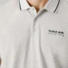 Polo in piqué con logo stampato Polo in piqué con logo stampato