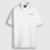 Polo in piqué con logo stampato Polo in piqué con logo stampato