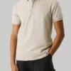 Polo in piqué con stampa sul retro