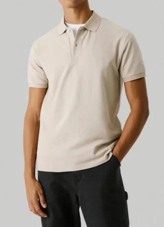 Polo in piqué con stampa sul retro
