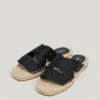 Sandali piatti con cinturini incrociati Sandali piatti con cinturini incrociati