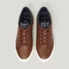 Sneakers classiche con dettagli in pelle scamosciata Sneakers classiche con dettagli in pelle scamosciata