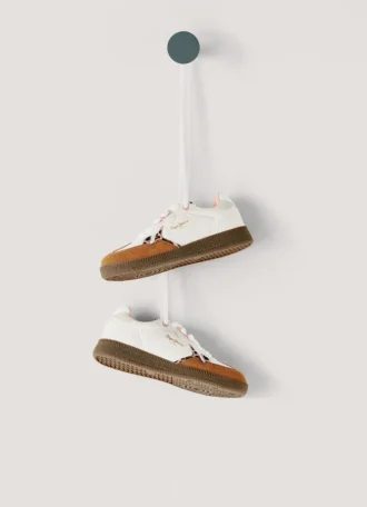 Sneakers con suola a conchiglia e dettagli animalier