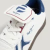 Sneakers con suola a cono effetto pelle Sneakers con suola a cono effetto pelle