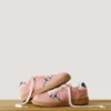 Sneakers con suola a cono effetto pelle scamosciata Sneakers con suola a cono effetto pelle scamosciata
