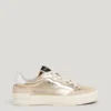 Sneakers dorate con dettagli animalier