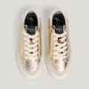 Sneakers dorate con dettagli animalier