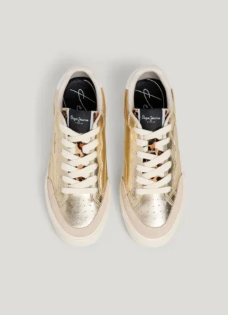 Sneakers dorate con dettagli animalier