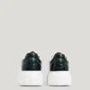 Sneakers in pelle con borchie