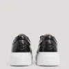 Sneakers in pelle con borchie