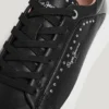Sneakers in pelle con borchie