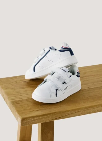 Sneakers in pelle con chiusura in velcro