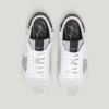 Sneakers in pelle con dettagli glitterati Sneakers in pelle con dettagli glitterati