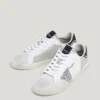 Sneakers in pelle con dettagli glitterati Sneakers in pelle con dettagli glitterati