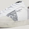Sneakers in pelle con dettagli glitterati Sneakers in pelle con dettagli glitterati