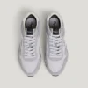 Sneakers in pelle con dettagli in pelle scamosciata Sneakers in pelle con dettagli in pelle scamosciata