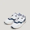 Sneakers in pelle con dettagli in pelle scamosciata Sneakers in pelle con dettagli in pelle scamosciata