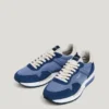 Sneakers in pelle con dettagli in pelle scamosciata Sneakers in pelle con dettagli in pelle scamosciata