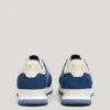 Sneakers in pelle con dettagli in pelle scamosciata Sneakers in pelle con dettagli in pelle scamosciata