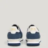 Sneakers in pelle con dettagli in pelle scamosciata Sneakers in pelle con dettagli in pelle scamosciata