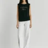T-shirt con dettagli borchiati