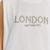 T-shirt con dettagli borchiati