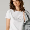 T-shirt con logo in strass