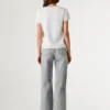 T-shirt con logo in strass