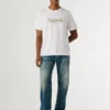 T-shirt con stampa logo e vestibilità regolare T-shirt con stampa logo e vestibilità regolare