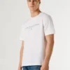 T-shirt con stampa logo e vestibilità regolare T-shirt con stampa logo e vestibilità regolare