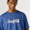 T-shirt con stampa logo e vestibilità regolare T-shirt con stampa logo e vestibilità regolare