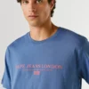 T-shirt con stampa logo e vestibilità regolare T-shirt con stampa logo e vestibilità regolare