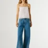 Top con spalline e dettagli traforati Top con spalline e dettagli traforati