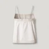 Top con spalline e dettagli traforati Top con spalline e dettagli traforati